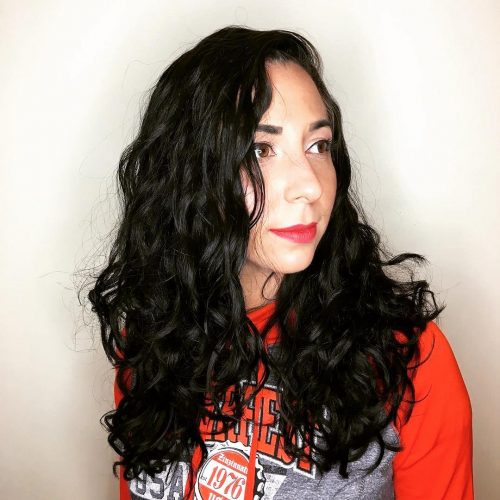 With texture at the forefront of pilus fashion these days 23 Cutest Long Curly Hairstyles