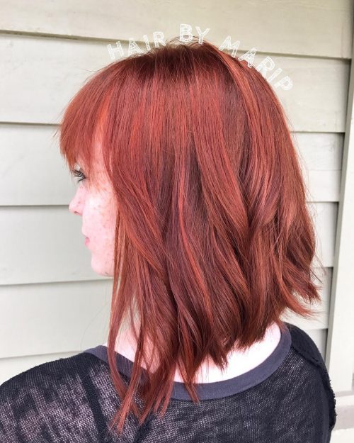 Adding bangs to a hairstyle is similar adding a cherry to the laissez passer on of an H2O ice cream sunday 53 Medium Hairstyles With Bangs: Our Latest Faves!