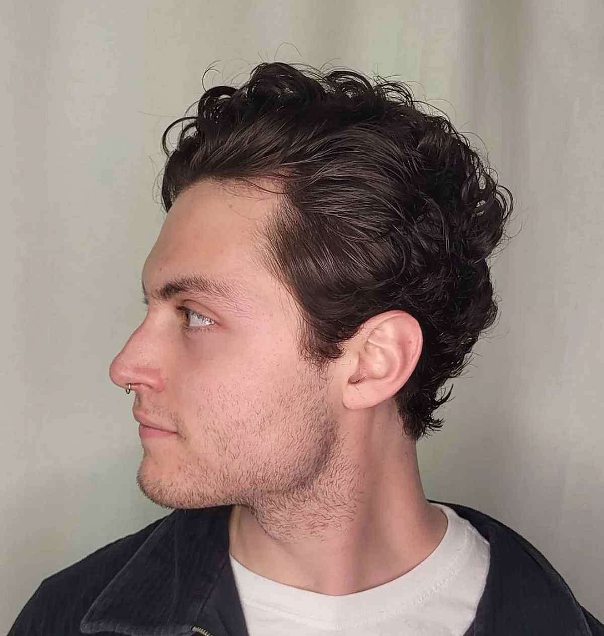 Medium Curly Quiff Hairstyle for Men