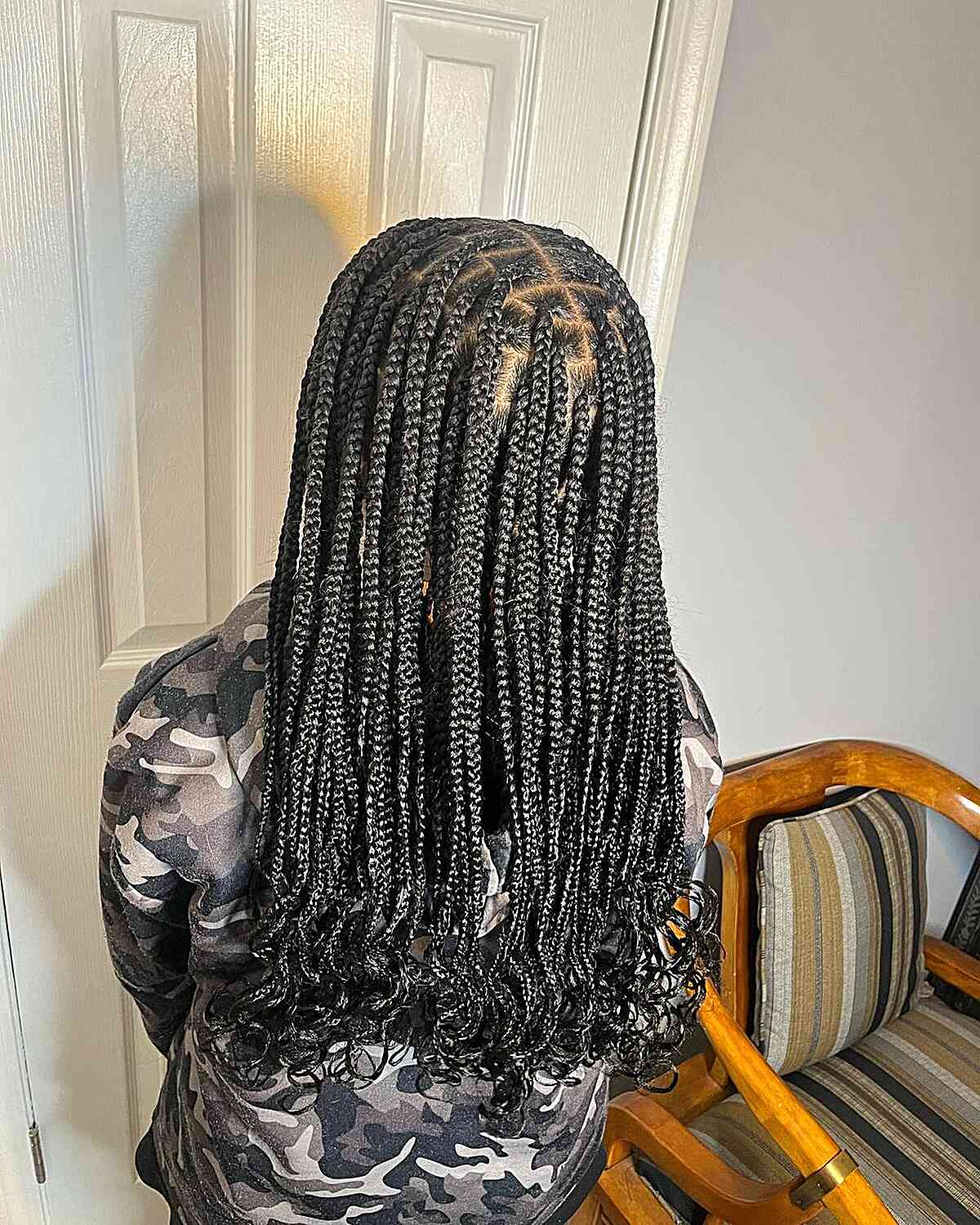 Medium Knotless Protective Braids with Curly Ends on Black Hair