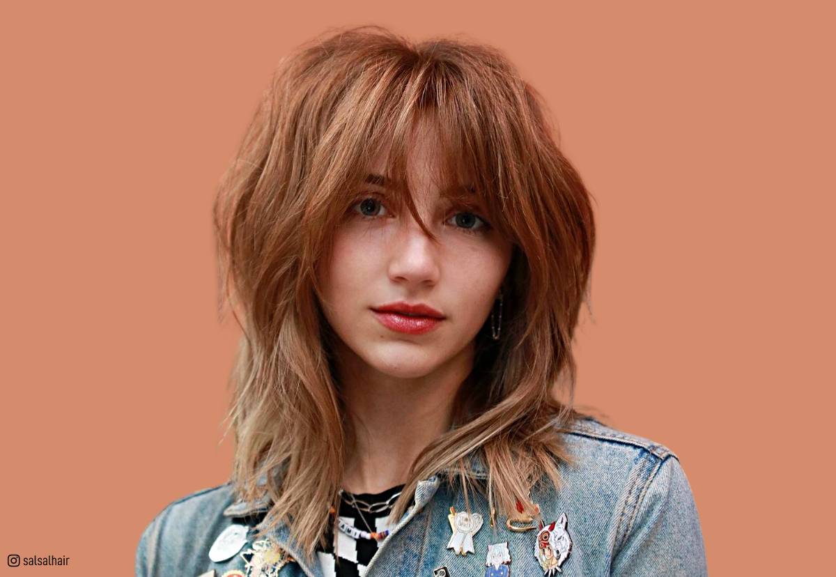 Image of Layers with a bang haircut for girls