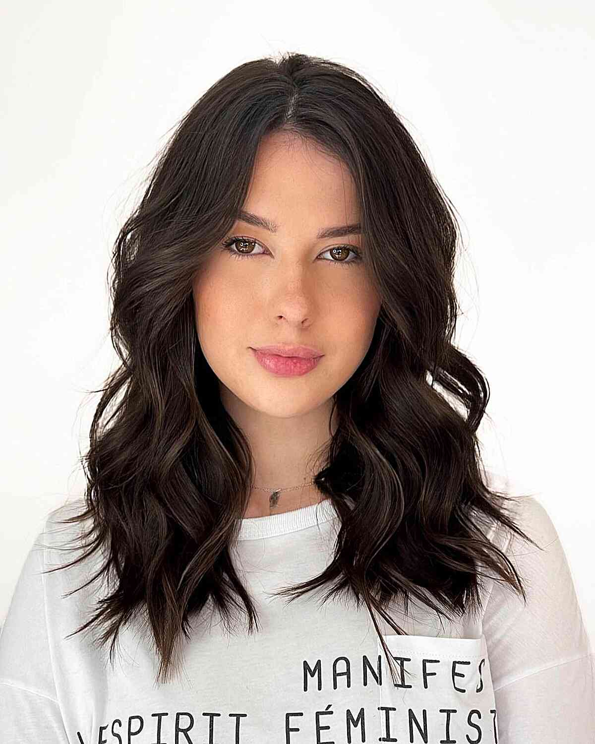 Medium-Length Brunette Shag with an Off-Center Part