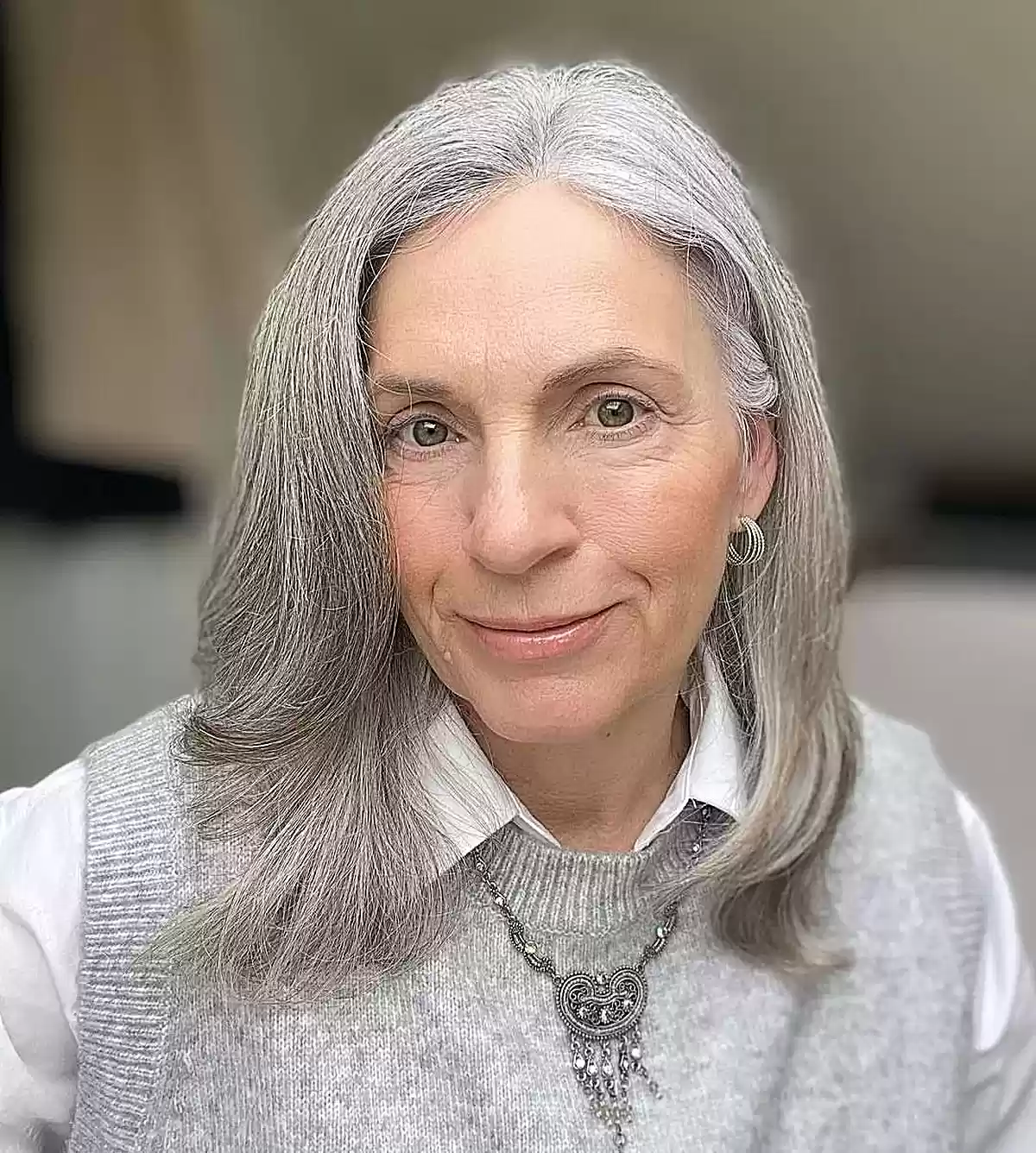 Medium-Length Soft Layered Grey Hair for 50-Year-Old Ladies
