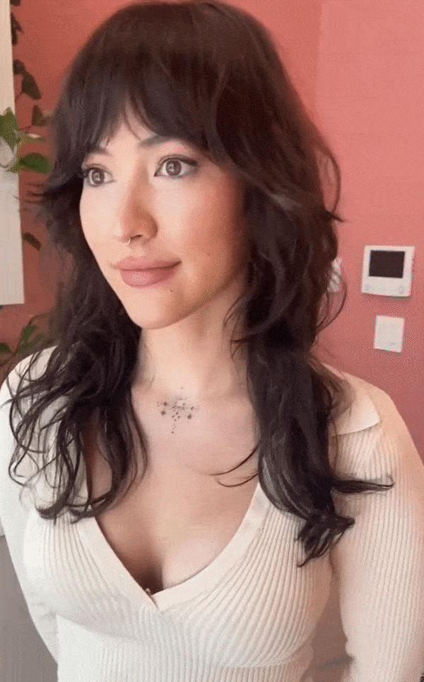 Medium razor cut shag with curtain bangs