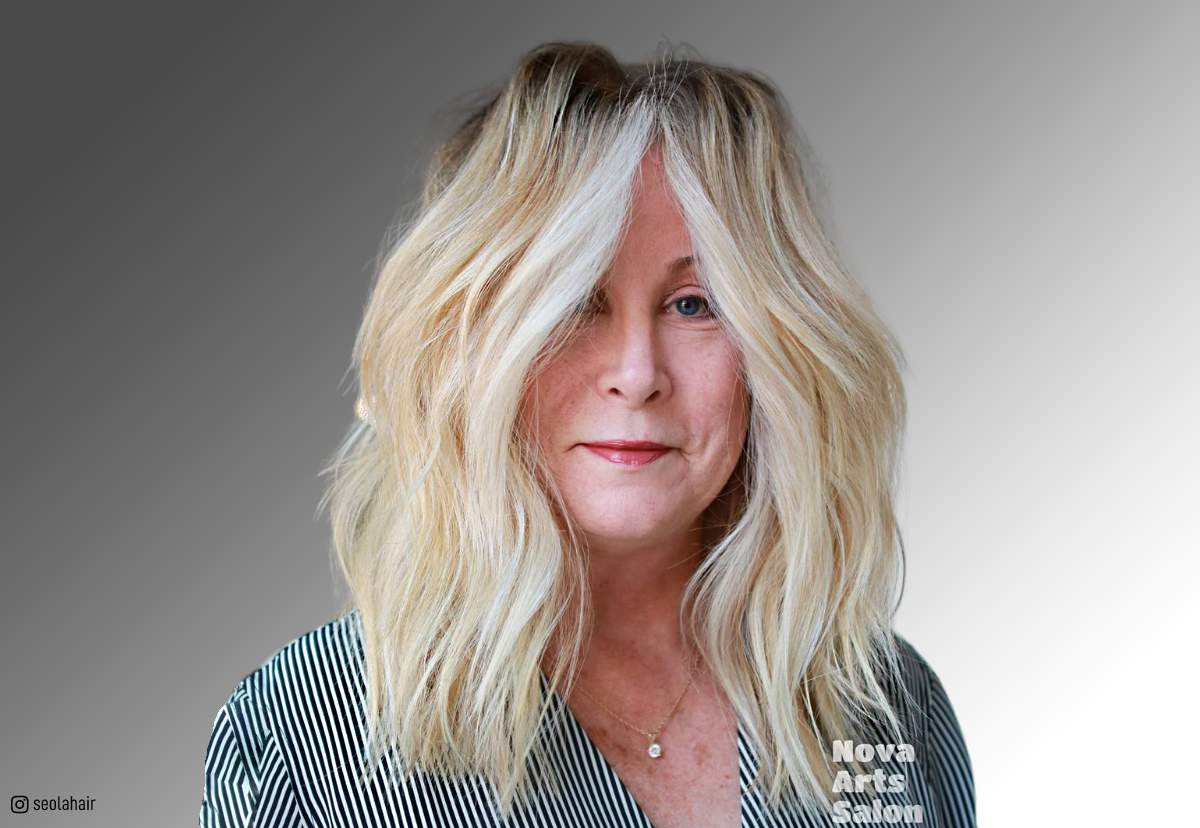 Image of Medium-length shaggy shag haircut for older women