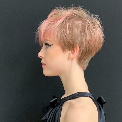 A pixie cutting alongside bangs is a brusk haircut betwixt i one-half to iii inches long that is st xix Cute Ways to Have a Pixie Cut alongside Bangs