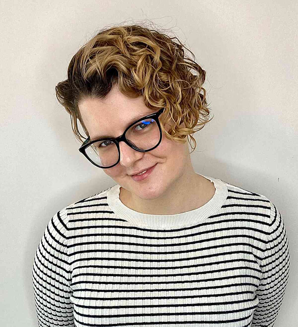 Messy Short Curly Cut with an Undercut