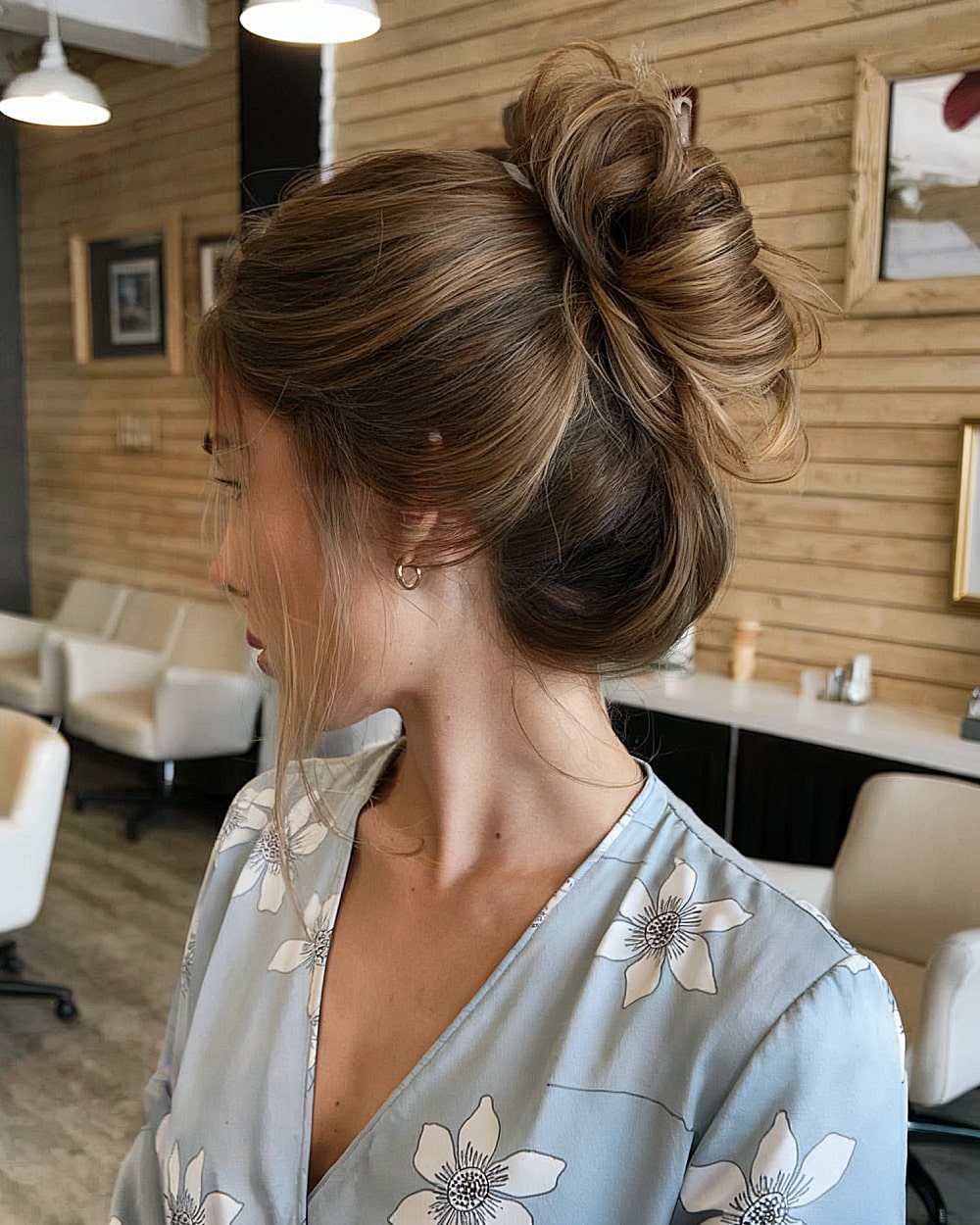 Voluminous messy French twist with soft texture for medium to long hair