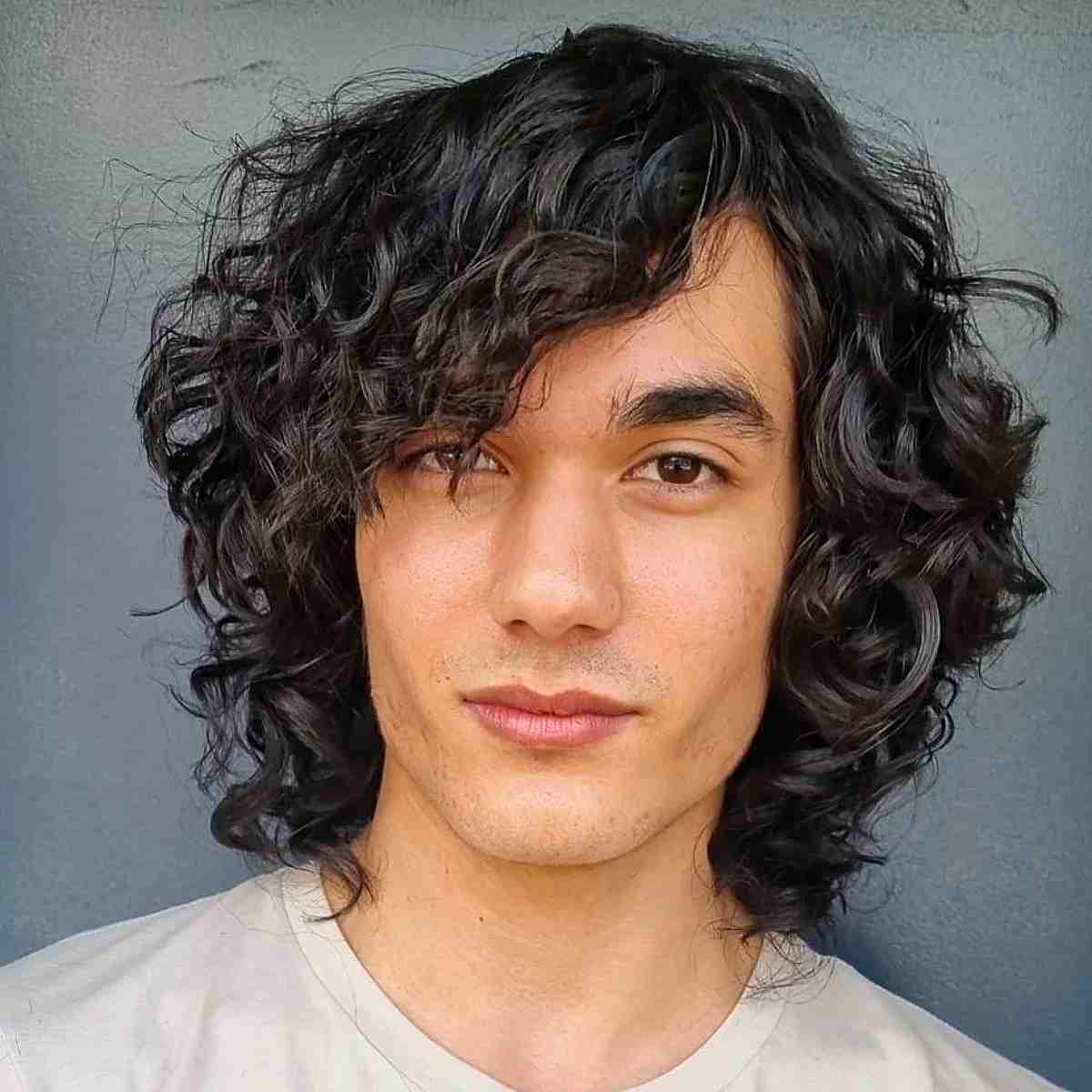 Mid-Length Curls with Side Bangs for Men
