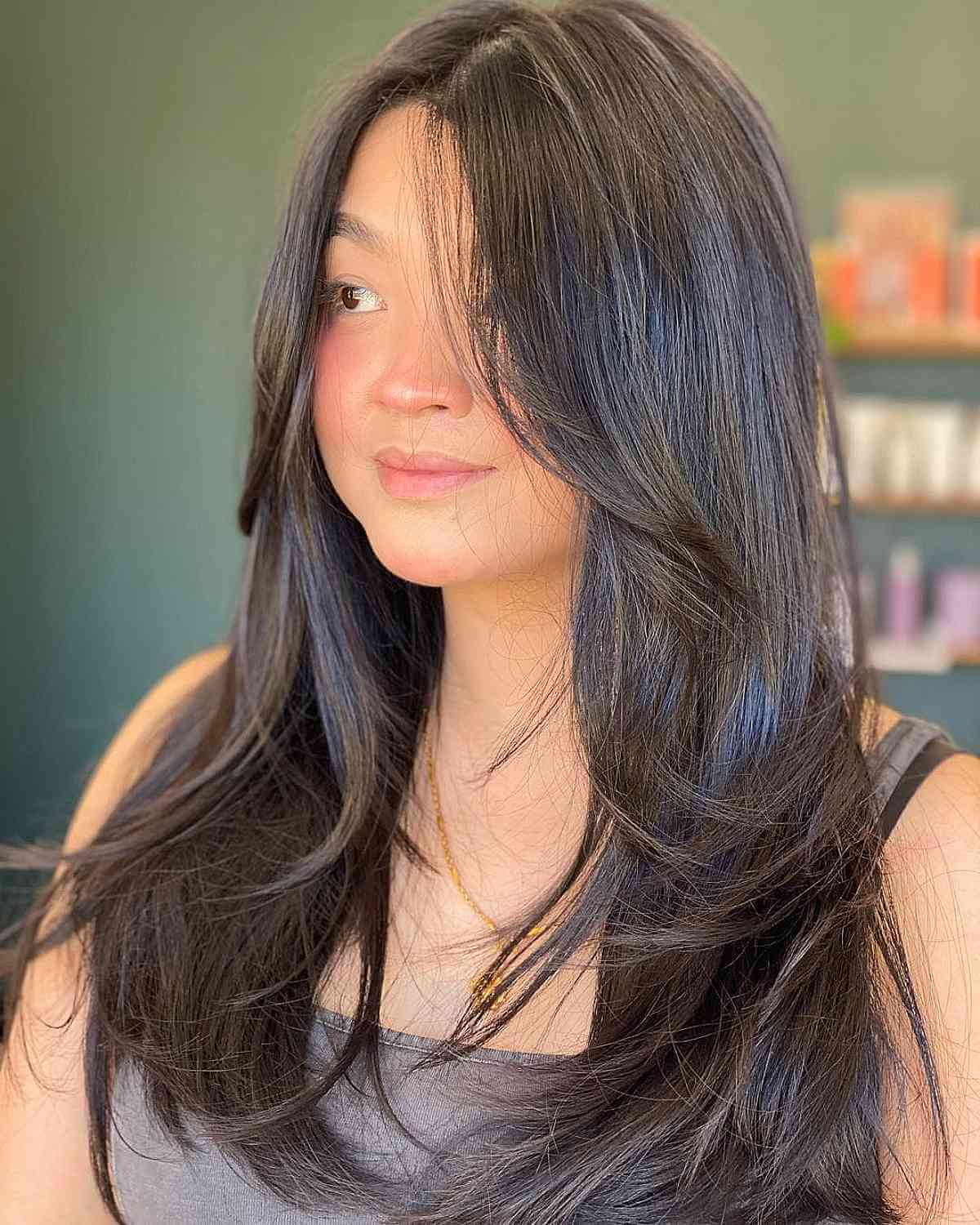 Middle Part Long Blowout for a Round Face