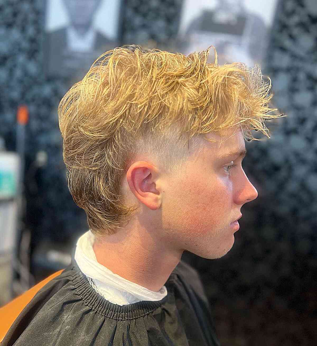 Mullet Undercut with Tousled Layers for Blonde Boys