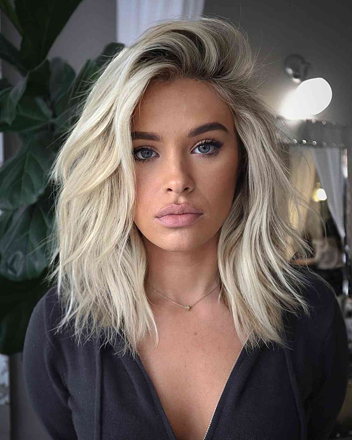 Perfectly platinum blonde color shoulder length