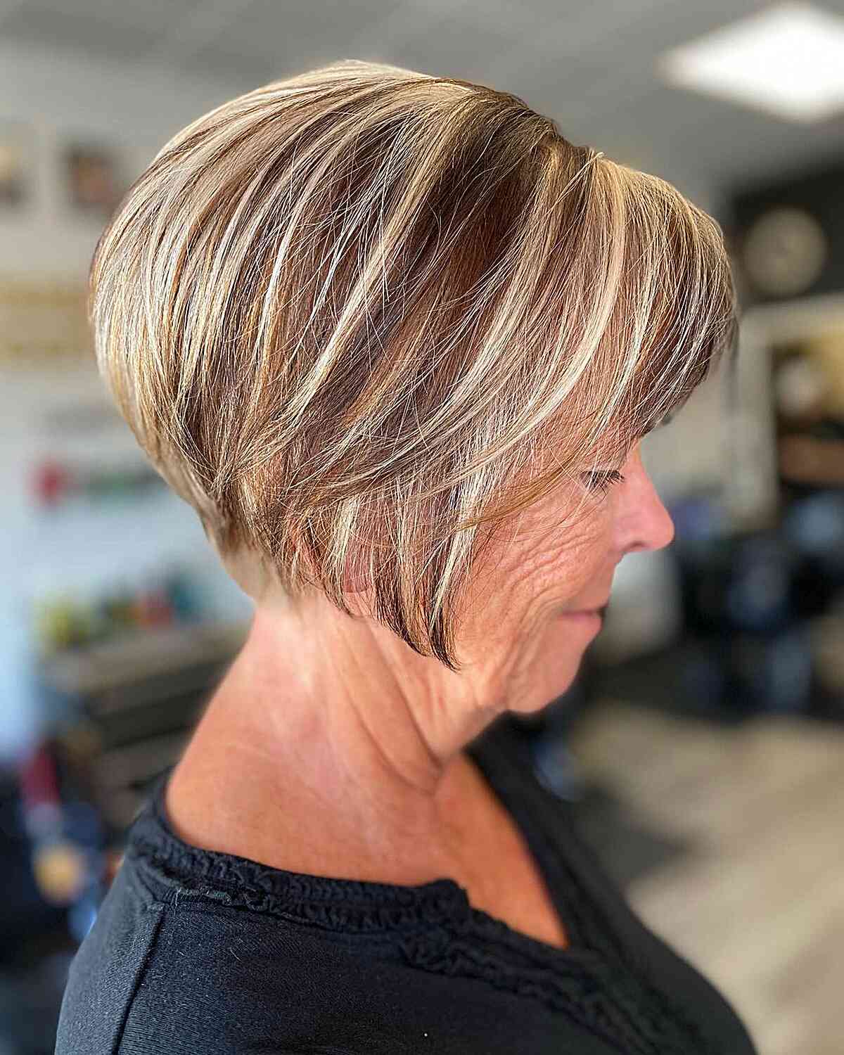 Jaw-Length Pixie Bob with Highlights and Lowlights for 70-Year-Old Women