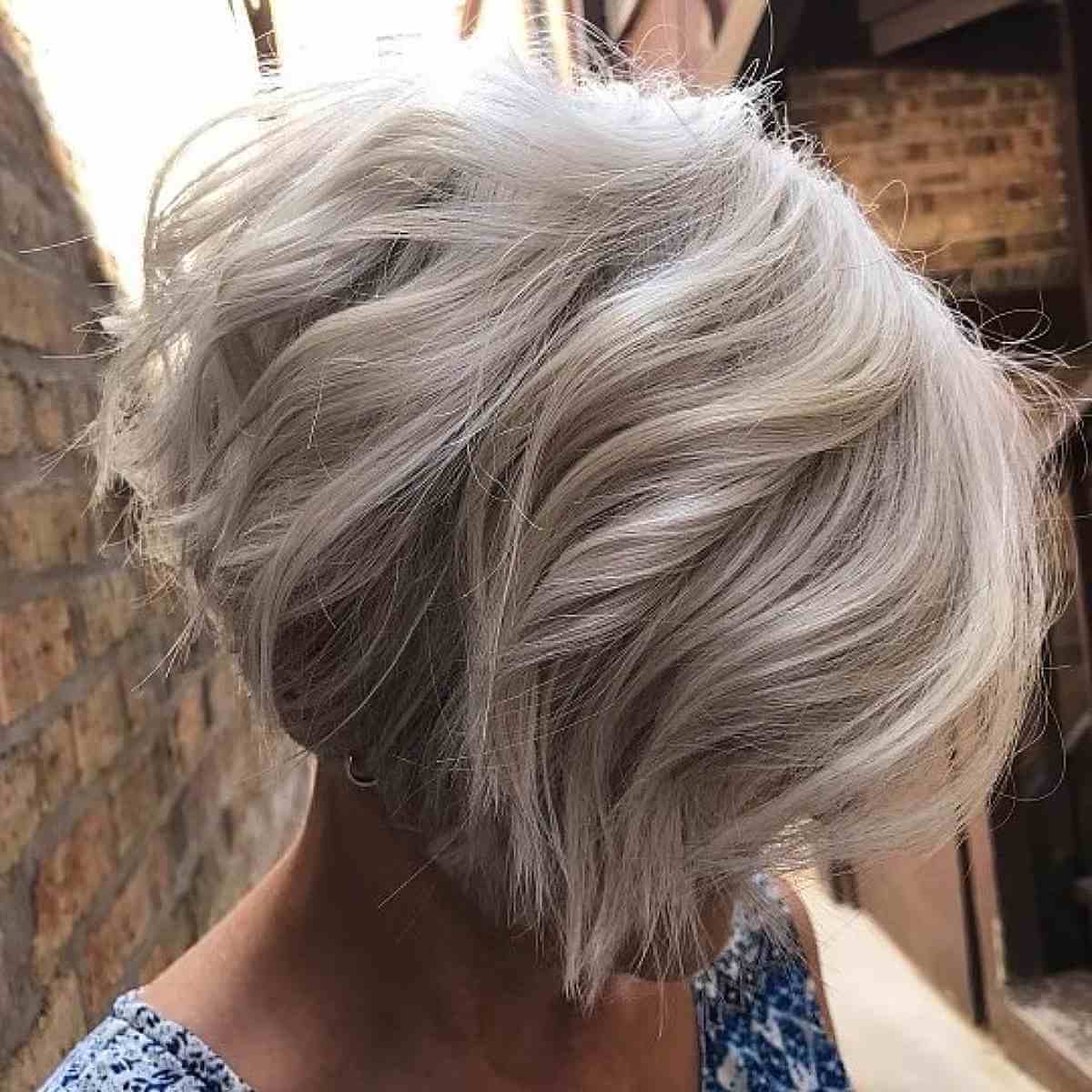 Short Platinum Blonde Layered Bob with Waves
