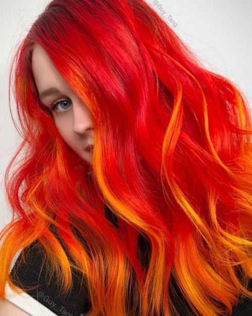 warm as well as intense shade of ruby-red dyed onto the pilus inwards the cast of highlights sixteen Stunning Bright Red Hair Colors to Get You Inspired