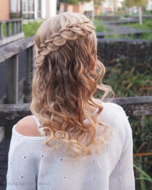 A quinceanera hairstyle is whatever hairdo worn on a daughter xv Stunning Quinceanera Hairstyles to Consider