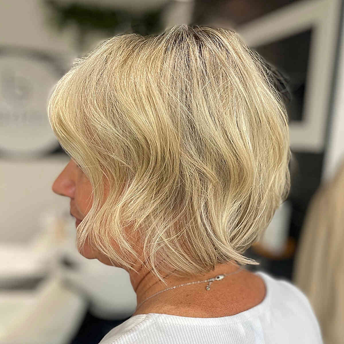 Rooted Blonde Short Wavy Bob for 50-year-olds with Finer Tresses