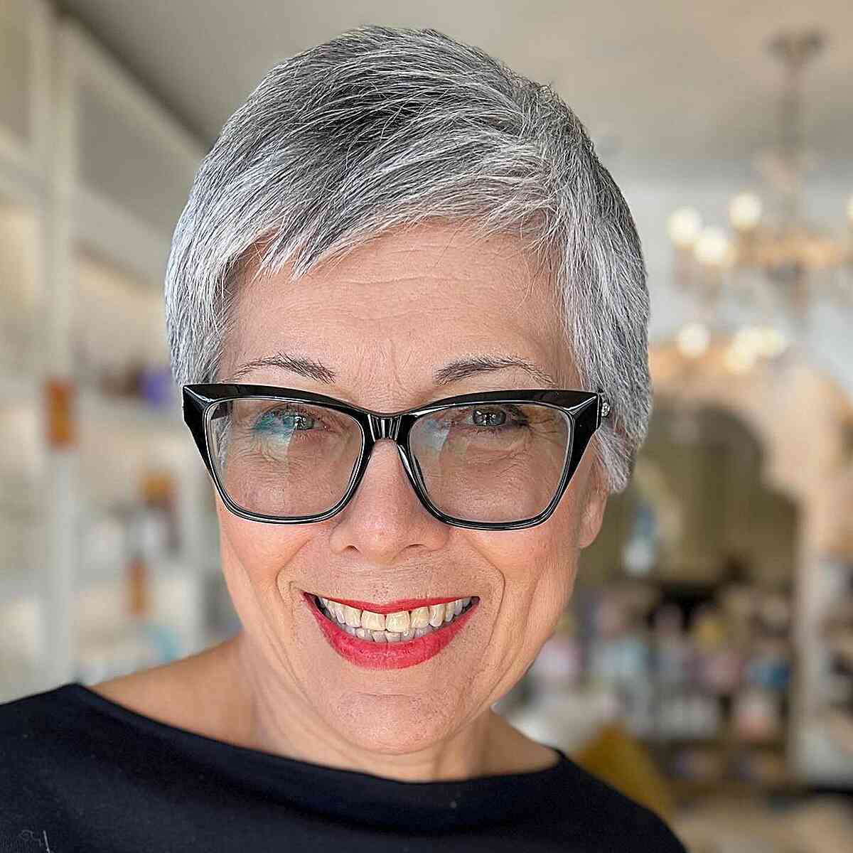 Salt-and-Pepper Short Pixie Haircut on Ladies Over 50 wearing Glasses