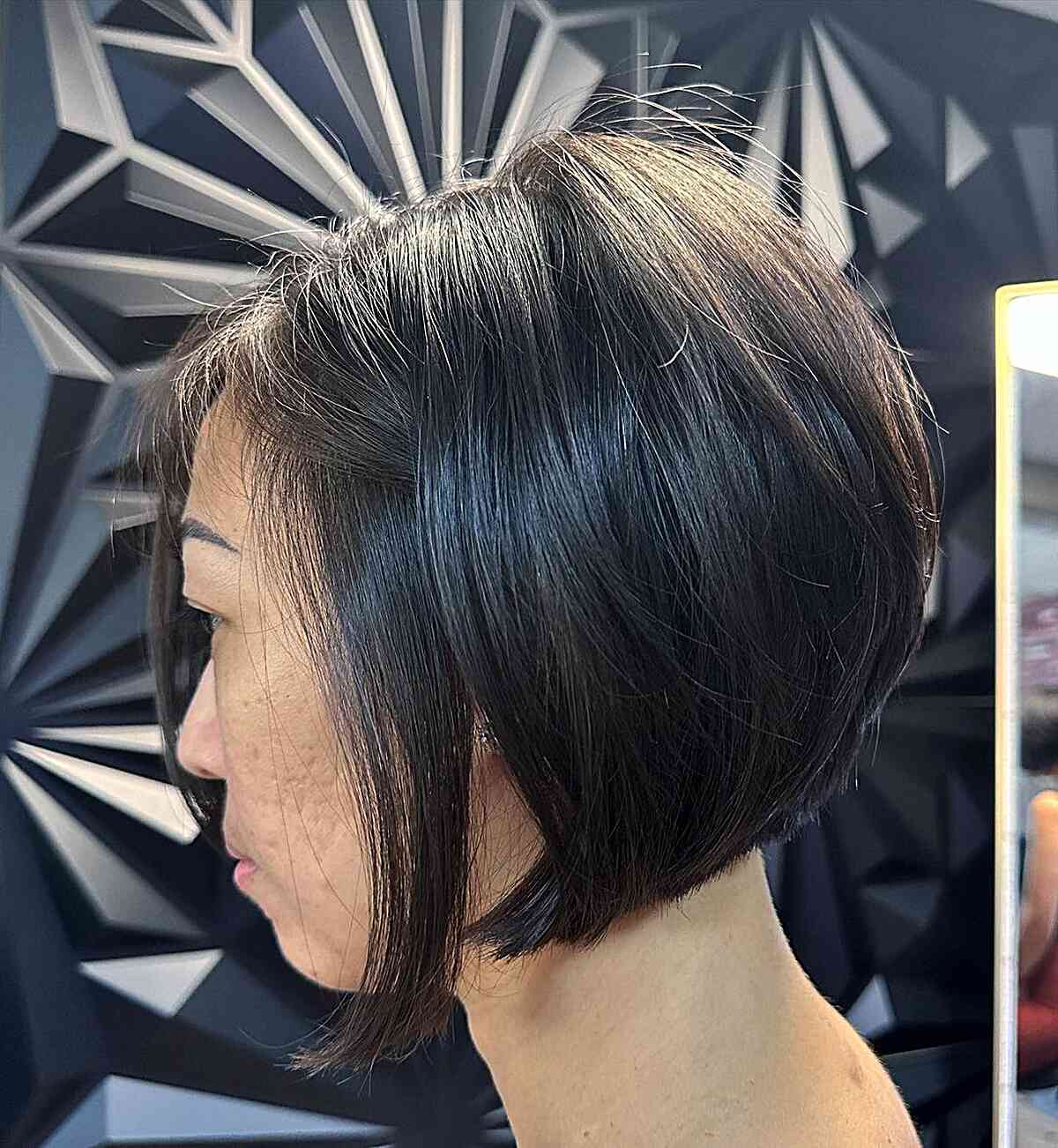 Sassy Edgy Chin-Length Bob with Subtle Layers