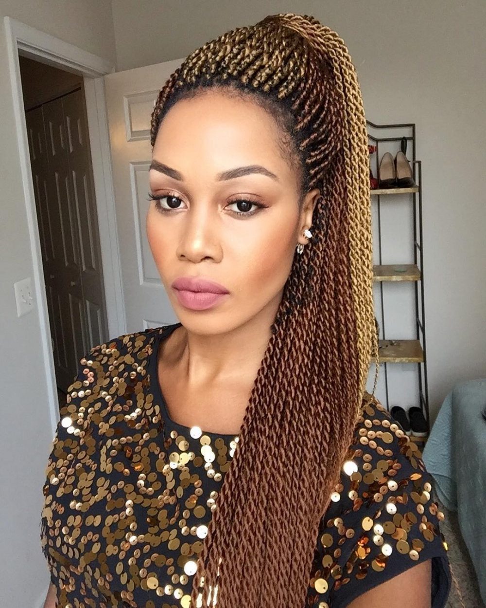 is a pop protective hairstyle for dark women who encompass their natural pi...