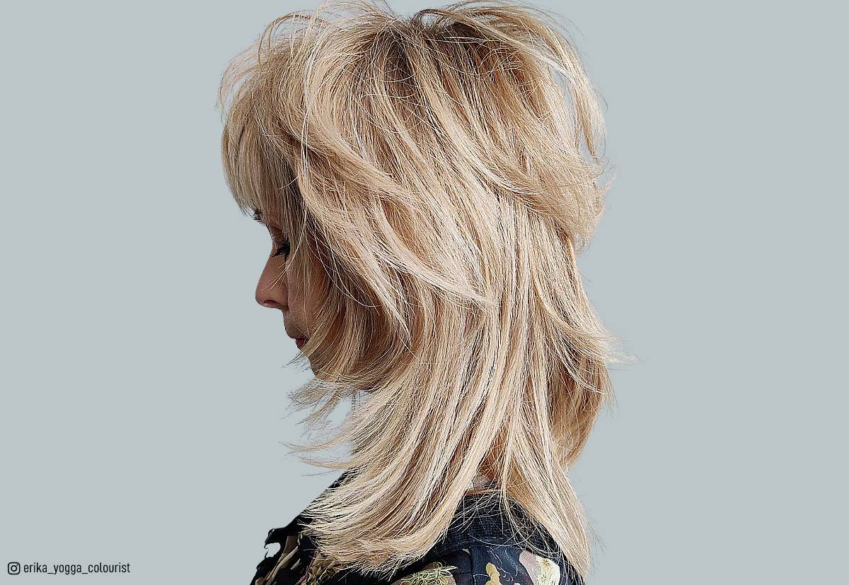 Image of 70s shag haircut woman feathered fringe