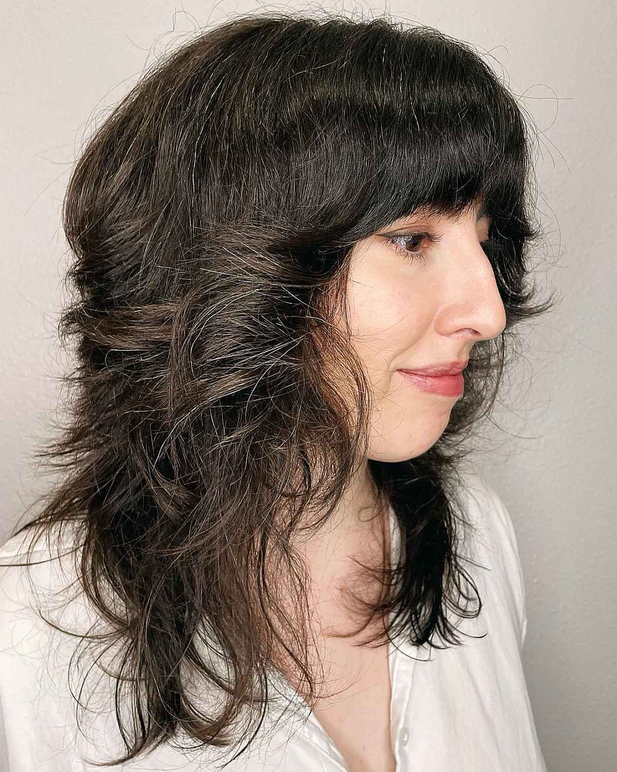 wolf cut with curtain bangs