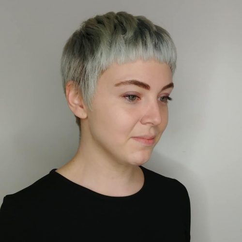 A pixie cutting alongside bangs is a brusk haircut betwixt i one-half to iii inches long that is st xix Cute Ways to Have a Pixie Cut alongside Bangs