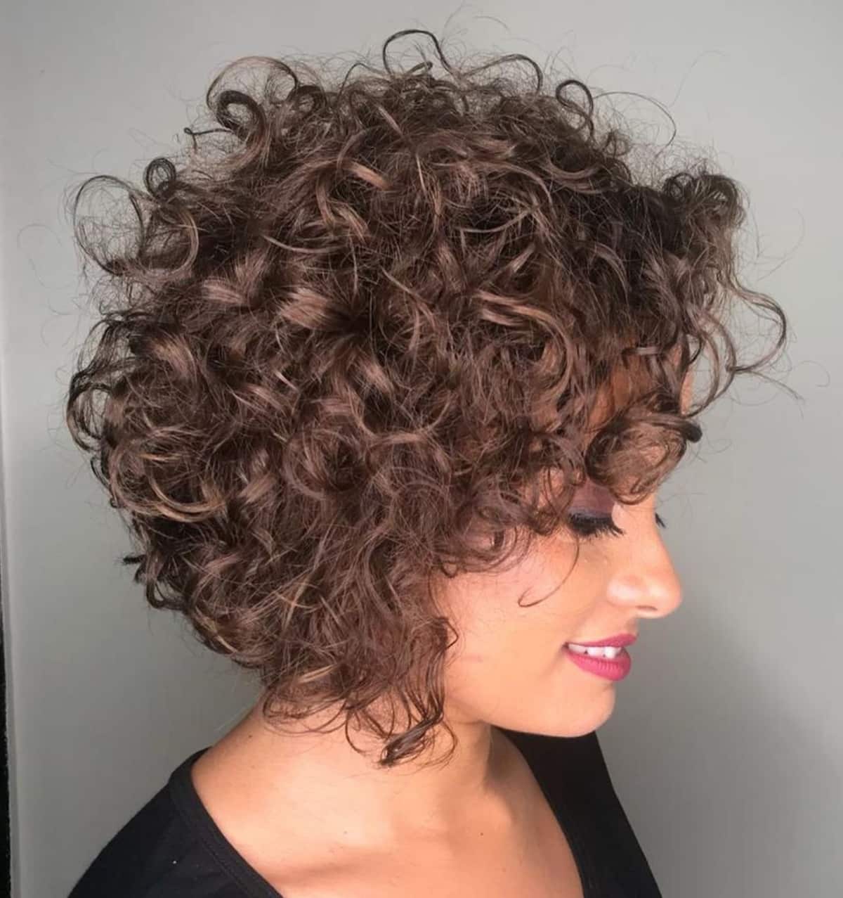 Cute short bob with brunette natural curls