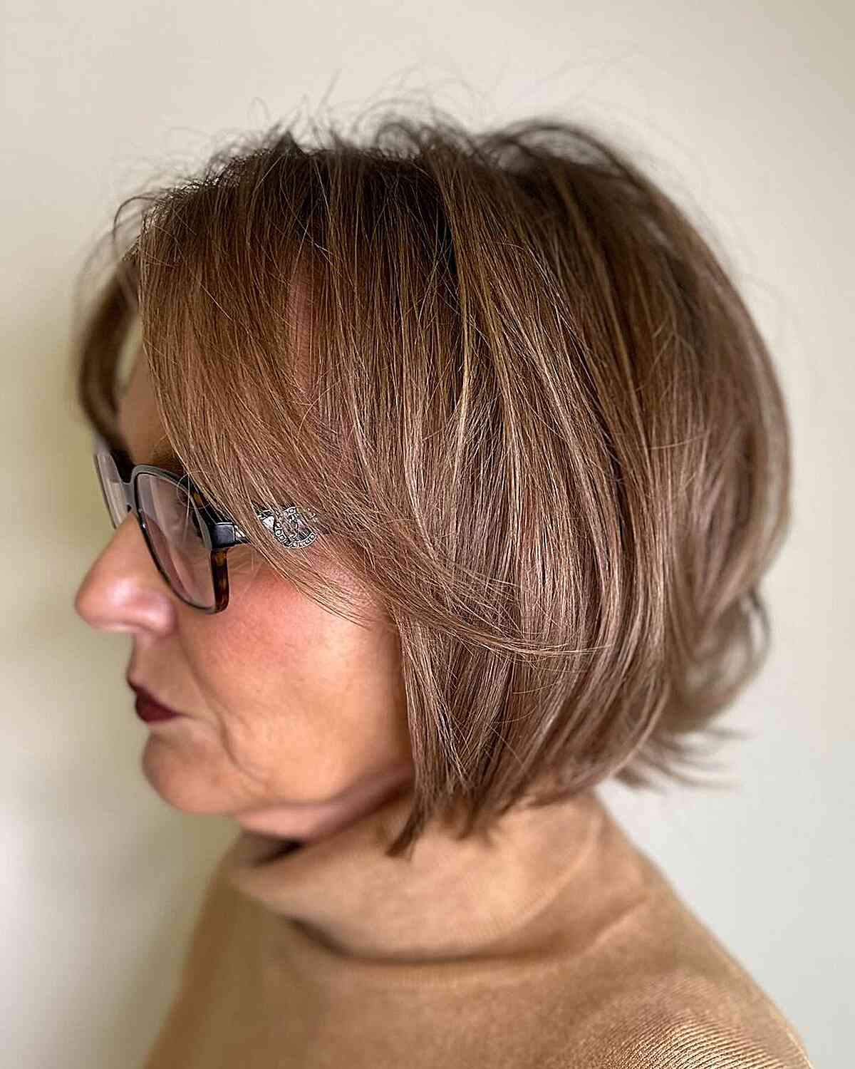 Short Bob with Face-Framing Bangs and Layers for ladies Aged 50