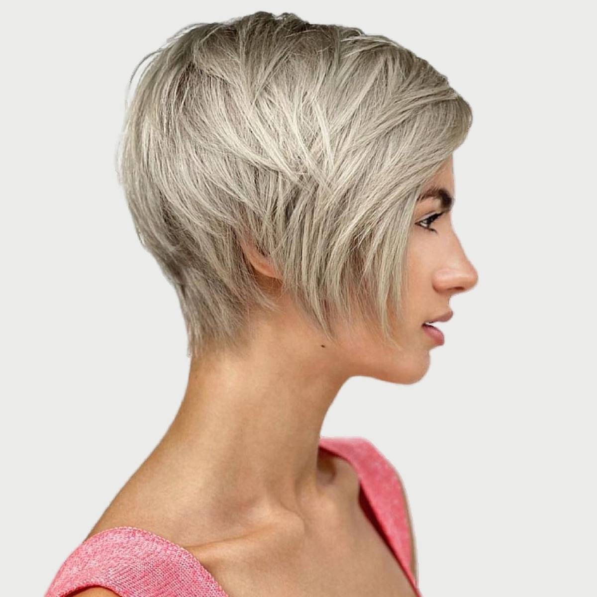 Image of Chipped layers short hairstyle for oval face over 50