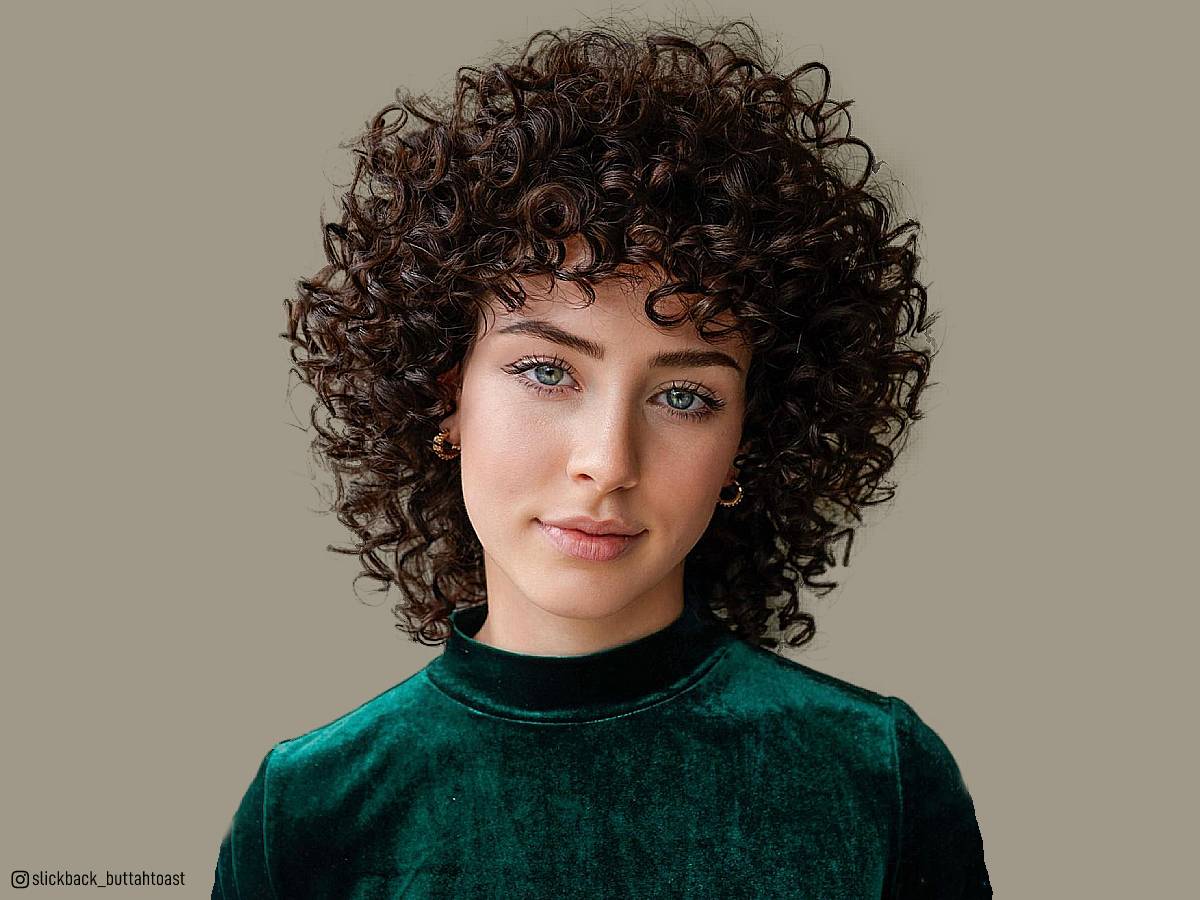 33 Best Short Curly Hair with Bangs to Try This Year