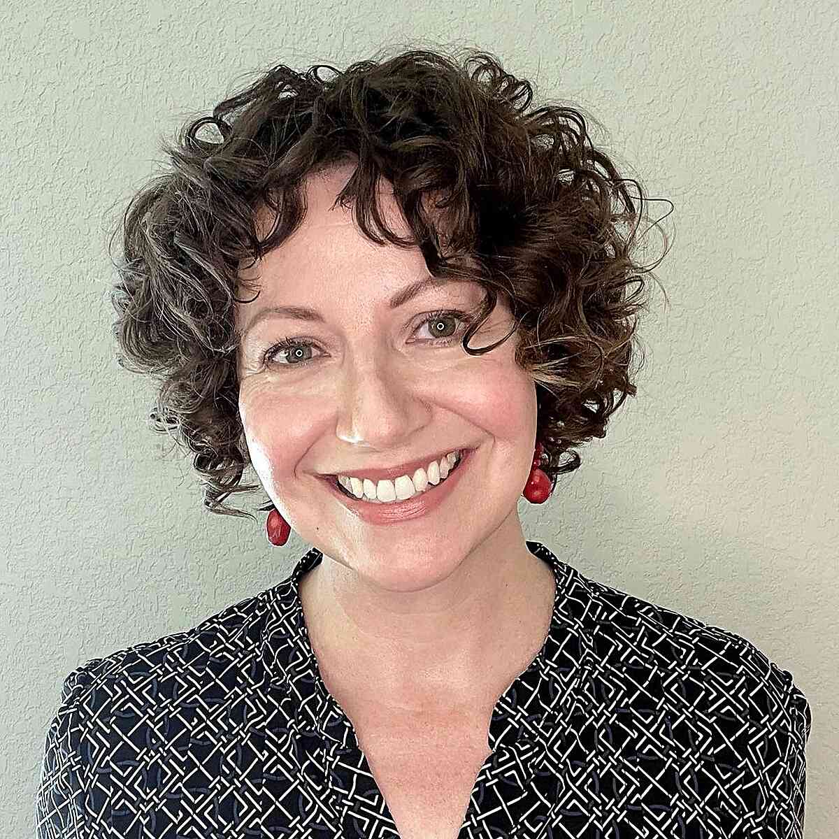 Short Glowing Curly Bob with Fun Fringe