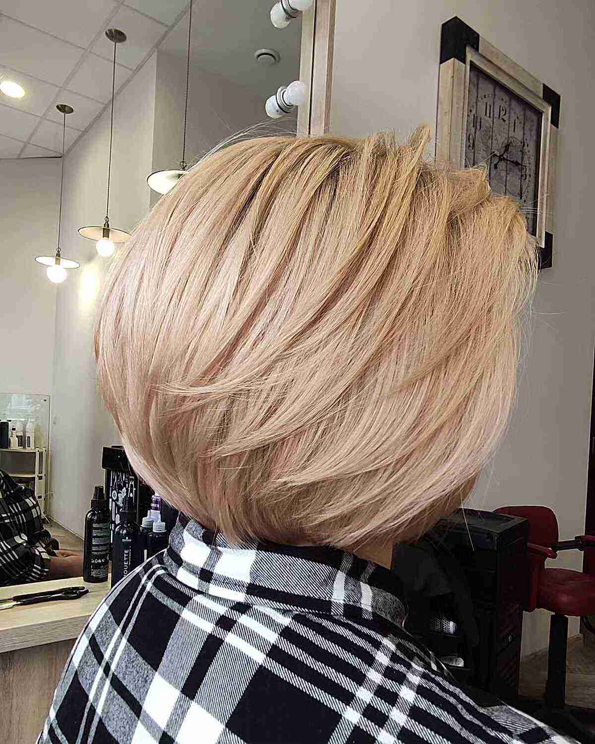 Short Layered Round Stacked Wedge Bob with Wispy Layers