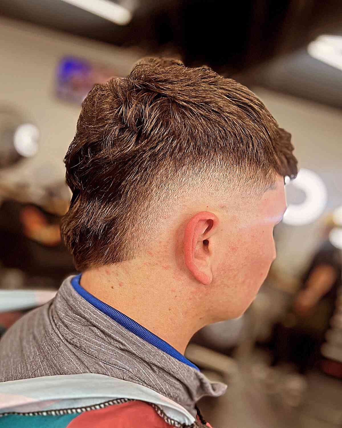 Short Mullet with Mid Burst Faded Sides for Young Men