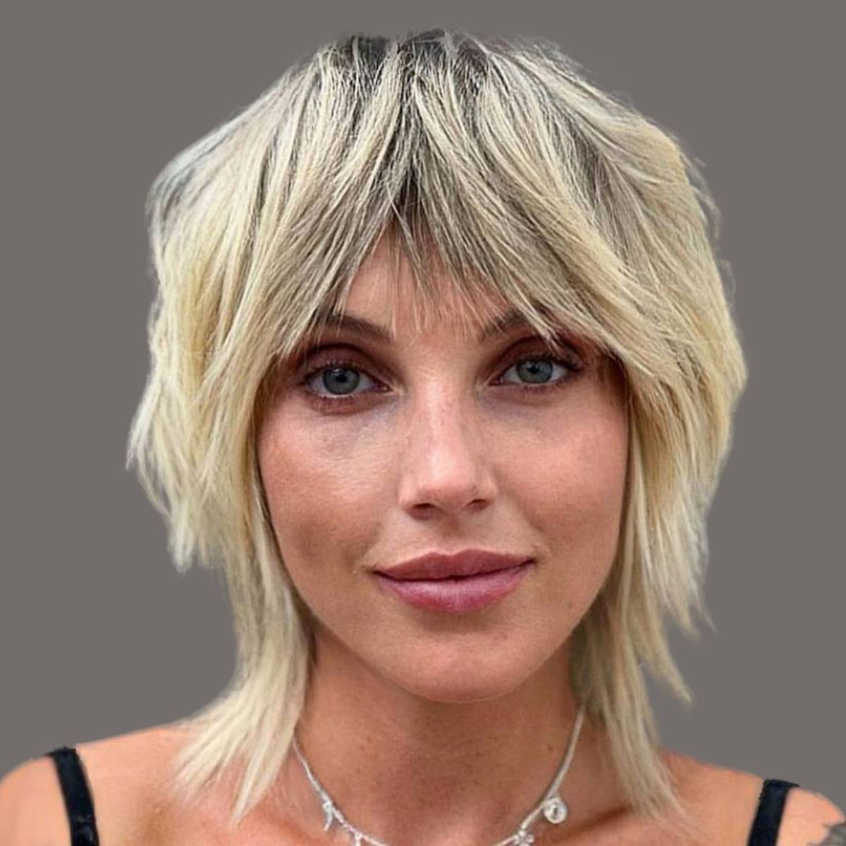 Image of Shag with short layers and a side part straight hair
