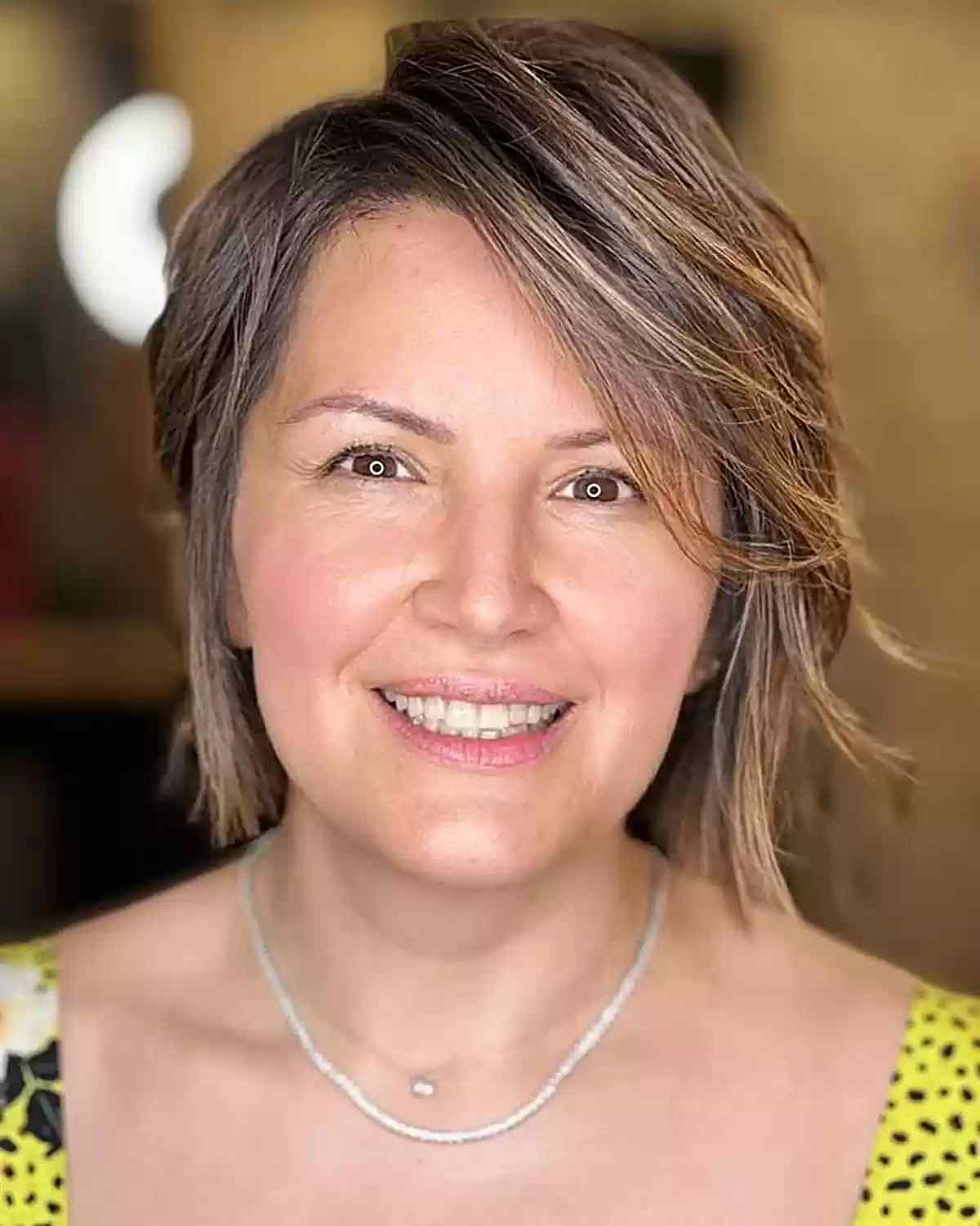 Short Sweeping Cut for Women Over 40 with Square Face Shapes