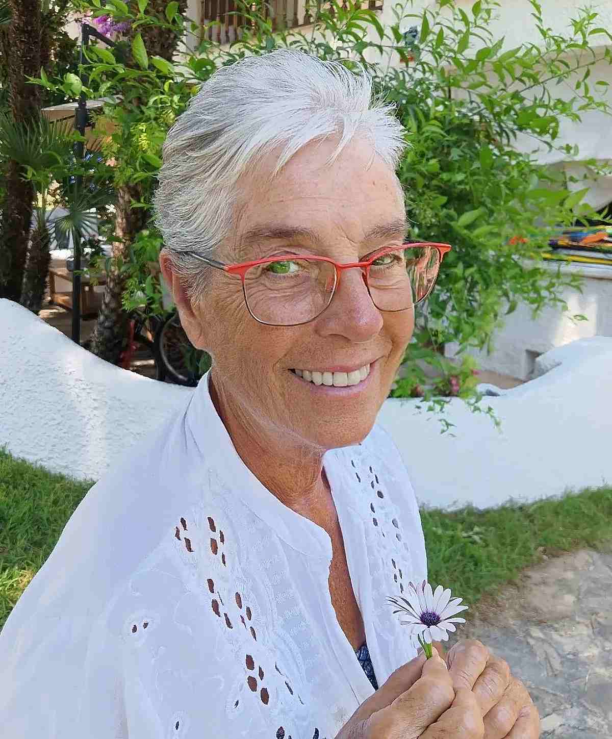 Short Swept-Back Pixie Hairstyle for an Old Woman