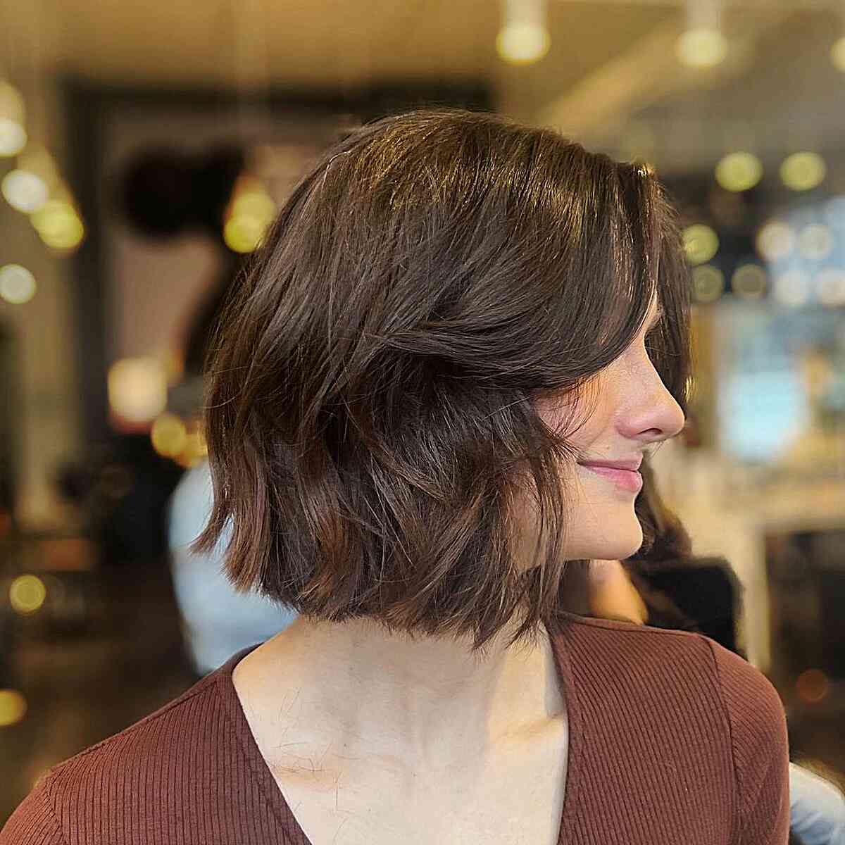Short Textured Italian Bob with Curtain Bangs for Thicker Locks