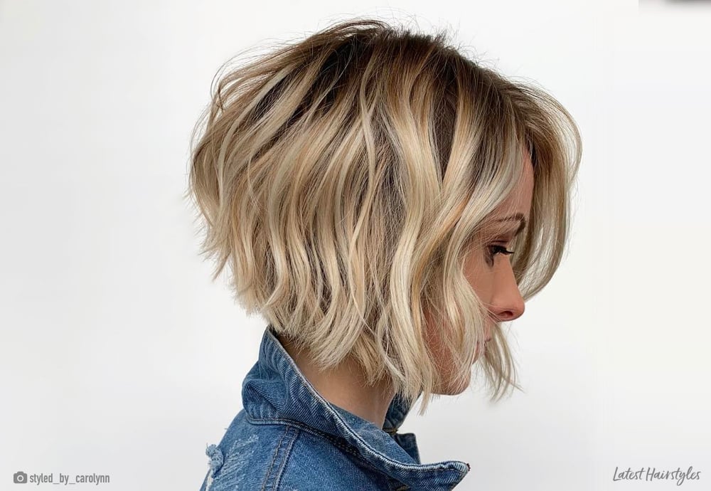 Image of Blunt A-line haircut on a woman with wavy brown hair