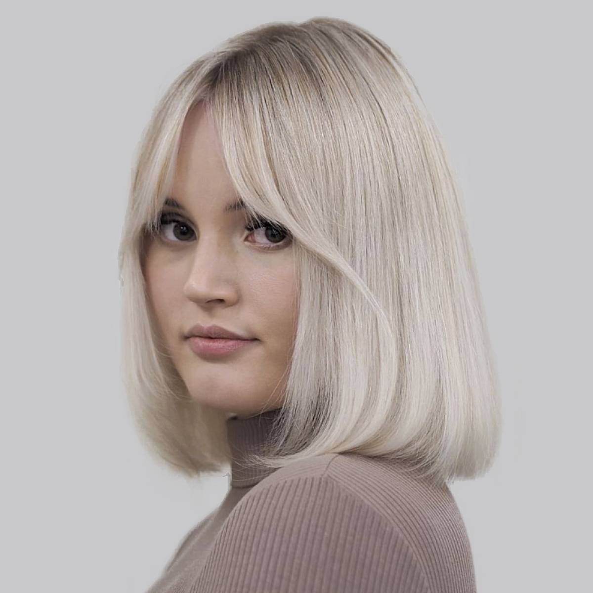 Image of Shoulder length blunt bob haircut woman