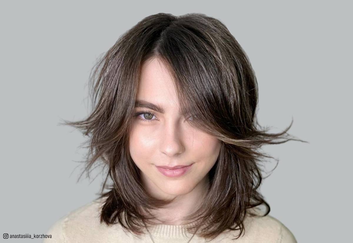 Image of Shaggy shoulder length hair with curtain bangs
