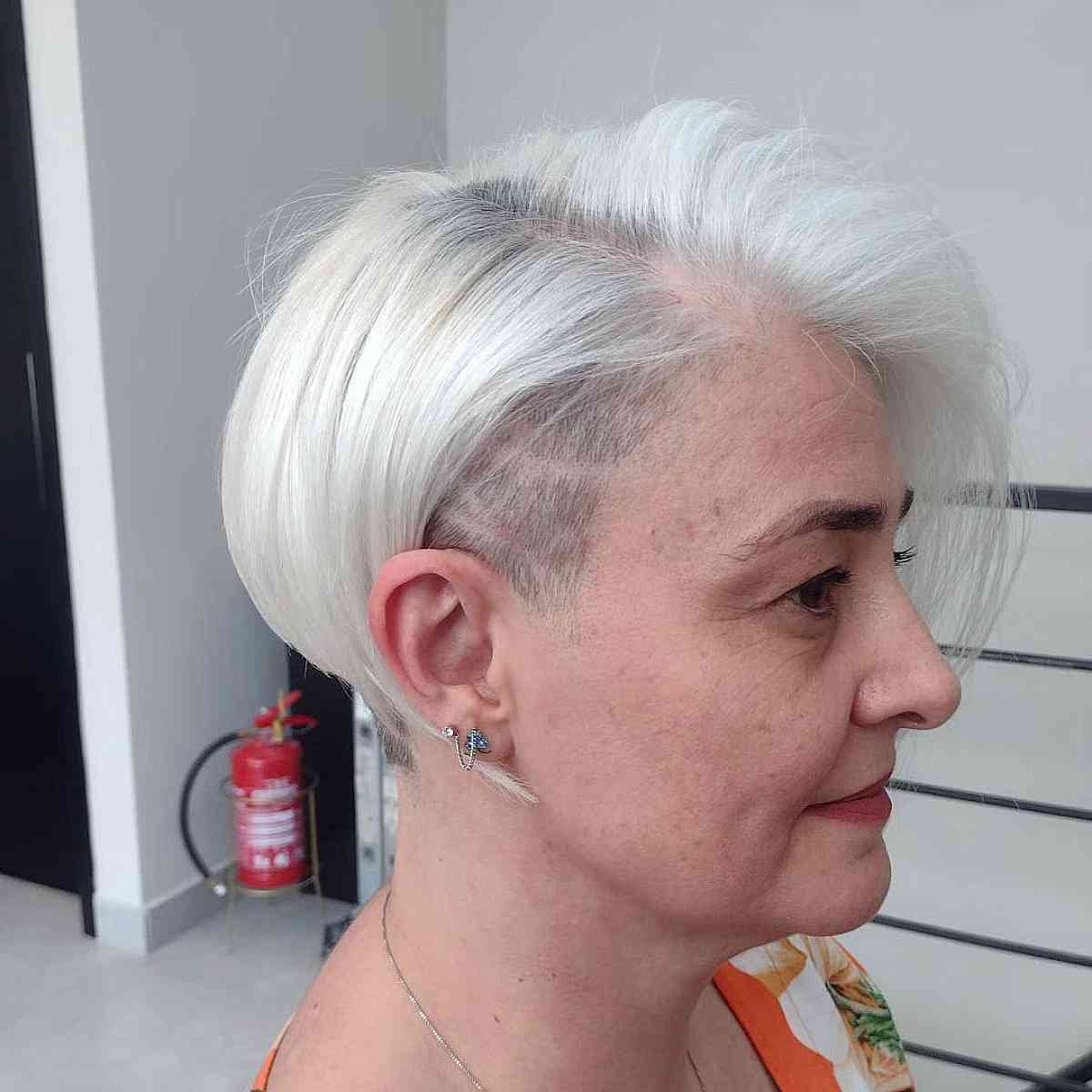Side-Parted Pixie Bob Undercut for 70-Year-Old Ladies
