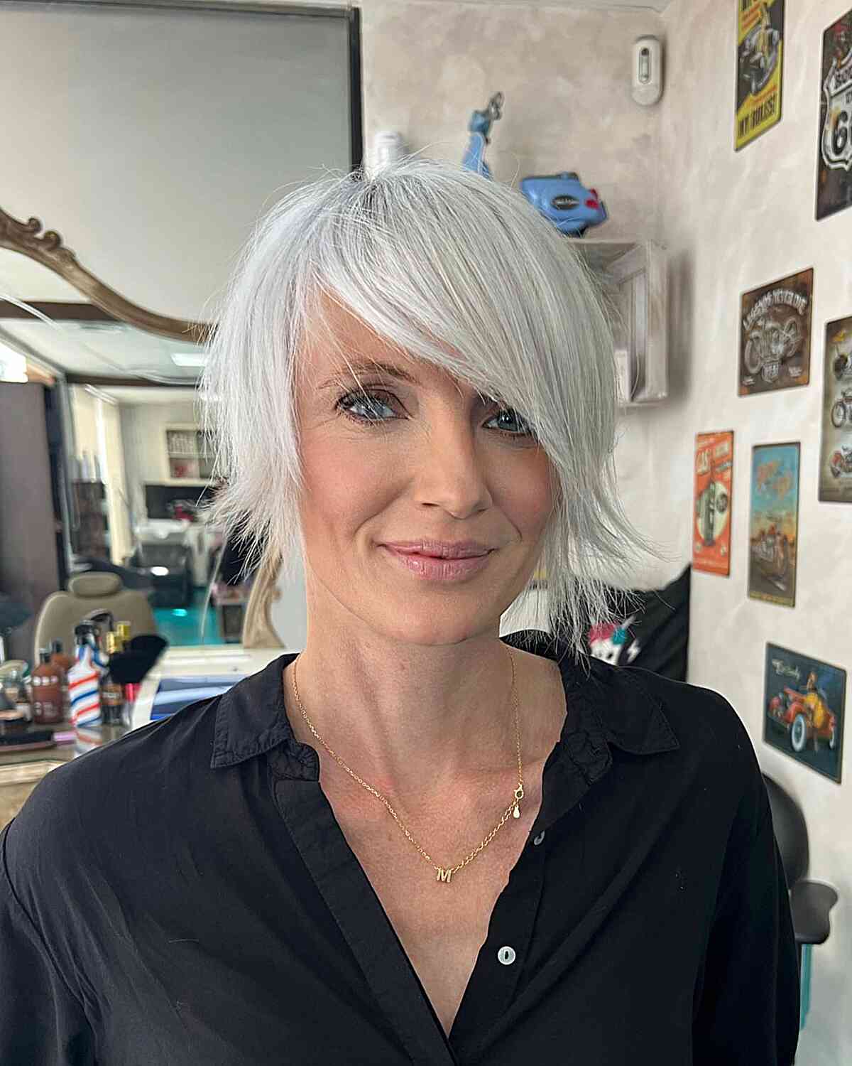 Short Silver Blonde Bob with Side-Swept Bangs for Seniors Over 50 with Fine Hair