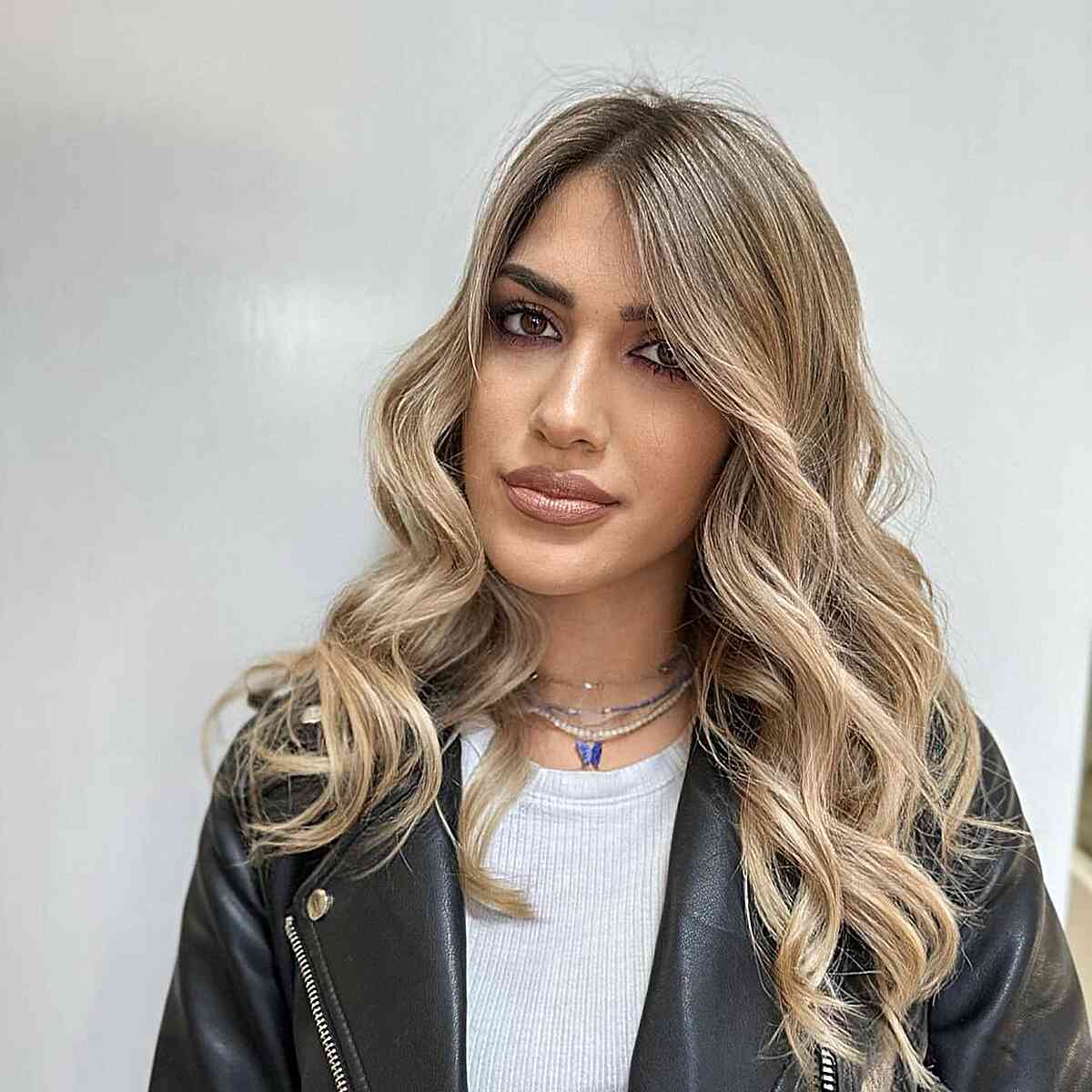 Simple Waves and Blonde Balayage Hairstyle for women with medium-length hair