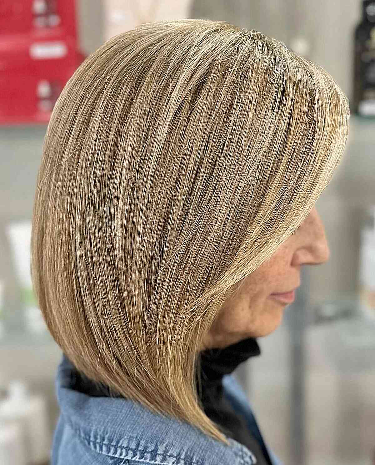 Sleek Angled Lob Haircut for Ladies Aged 60 with Thick Mane