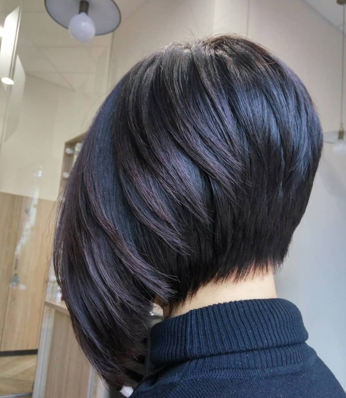 Sliced bob haircut with shorter layers