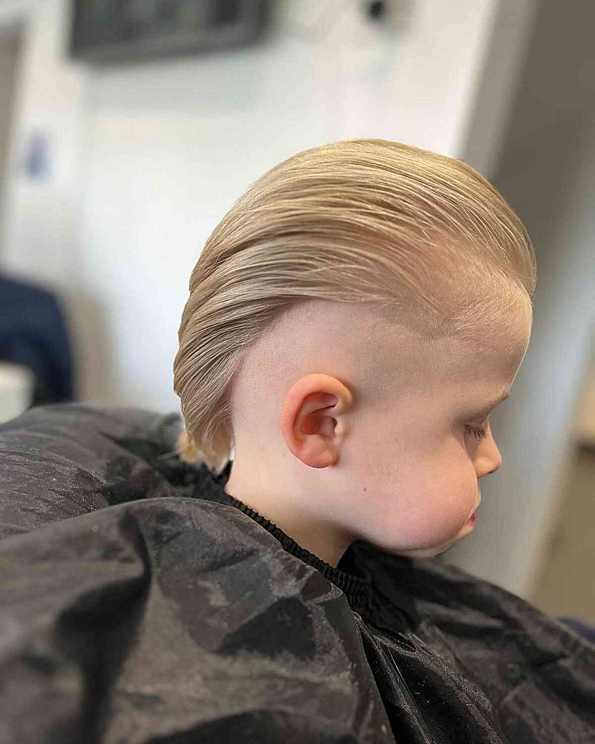 Slicked Back Blonde Mohawk Undercut Style on Young Boys