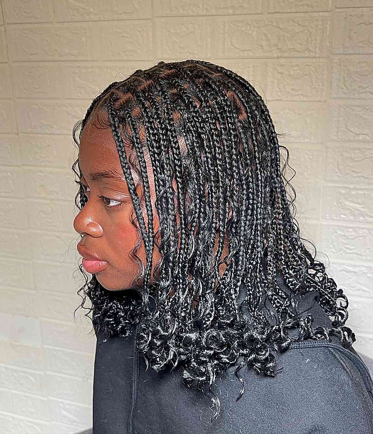 Shoulder-Length Small Boho Knotless Braids with Curly Ends