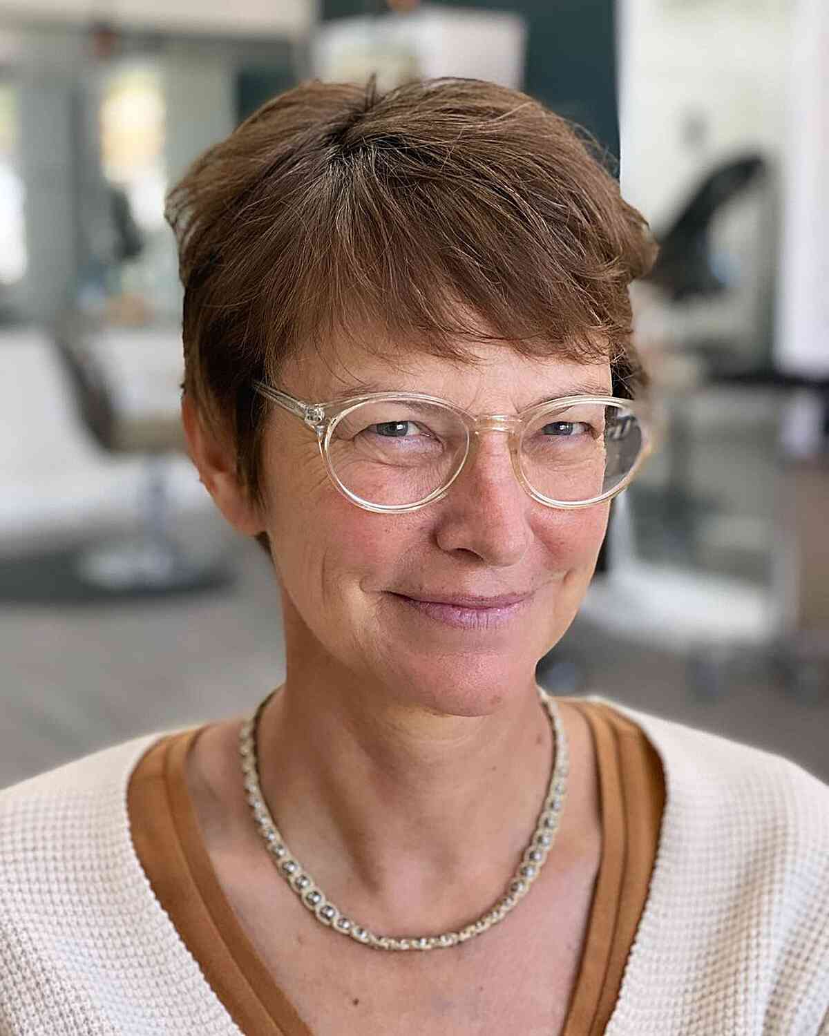 Soft Pixie Style with Sweeping Fringe for Mature Ladies Aged 50 Wearing Glasses