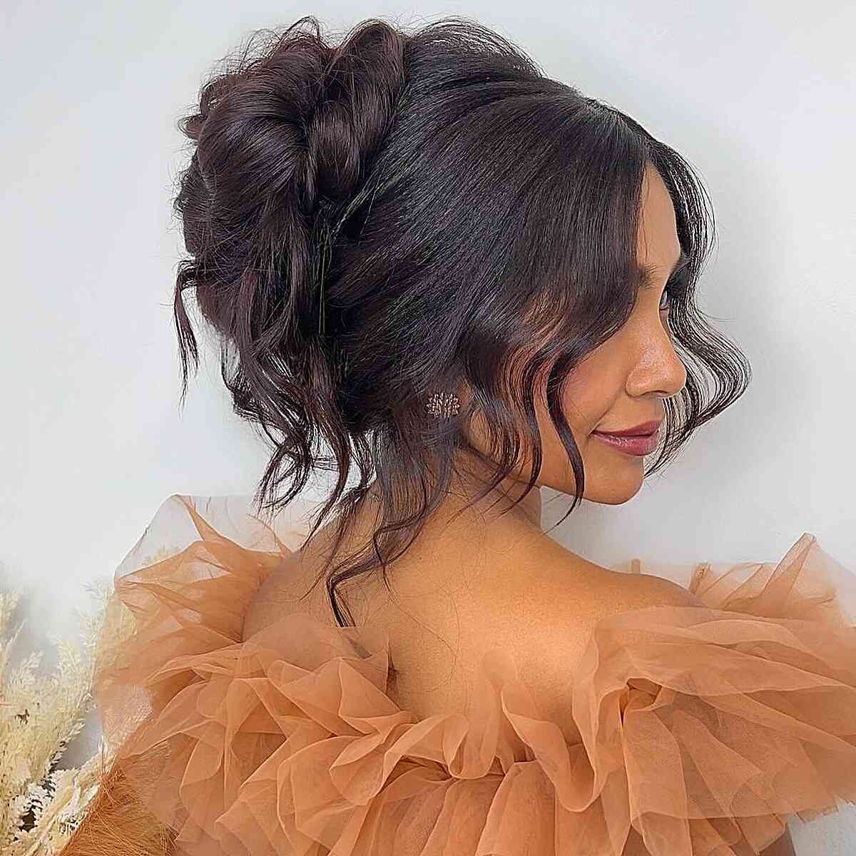 Soft Romantic Gala Twist Updo with a Wavy Face Frame